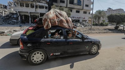 Residents begin to evacuate Gaza city on Friday after an Israeli warning of increased military operations in the Gaza Strip. EPA