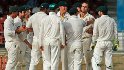 Australian bowler Nathan Lyon, second from right, took five wickets against the West Indies.