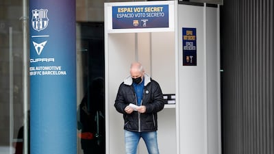 A Barcelona supporter after casting his vote in the presidential election. Reuters