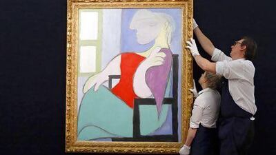 Picasso's Femme Assise on auction in London. Suzanne Plunkett / Reuters