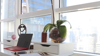 El Lababidi took her cues from the apartment’s expansive views, which included JLT’s man-made lake and the greens of the Emirates Golf Club. Courtesy Harf Noon Studio