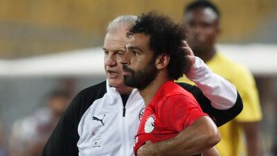 Egypt head coach Javier Aguirre with Salah before he comes on as a substitute. Reuters