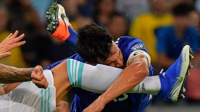 Paraguay's Gustavo Gomez is fouled by Argentina's Nicolas Otamendi. AFP