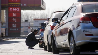 Cars lined up at a filling station for liquid natural gas (LNG) in Baoding, Hebei province, China. Thomas Peter / Reuters
