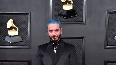 J Balvin, sporting a black Givenchy look. AP