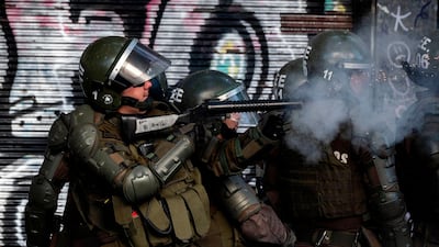 Riot policemen clash with demonstrators. AFP