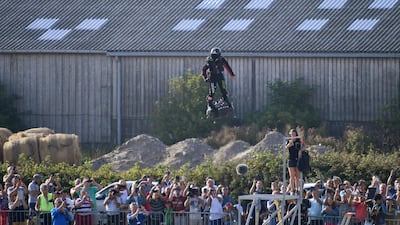 Franky Zapata stands on his jet-powered "flyboard" as he takes off from Sangatte, northern France. AFP
