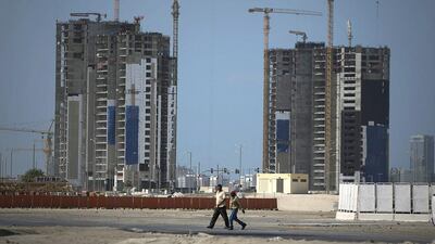 Abu Dhabi has the slowest rate of housing completion in six years, which is likely to fuel further inflation. Silvia Razgova / The National