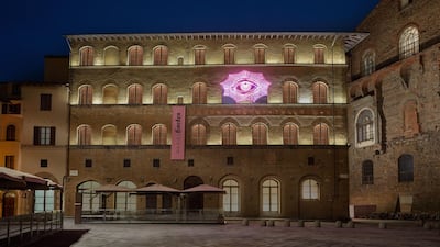 A neon-pink eye on the Gucci Garden facade. Courtesy Gucci