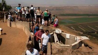 Israeli tourists gather at the Mount Bental army post lookout from the 1967 war in the Golan Heights, which overlooks Syria.