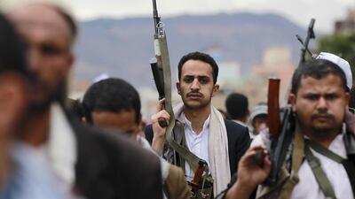 Shiite rebels, known as Houthis, hold up their weapons to protest against Saudi-led airstrikes, during a rally in Sanaa, Yemen. (AP Photo/Hani Mohammed, File)