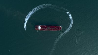 Speedboats from Iran's Revolutionary Guard circle the British-flagged oil tanker Stena Impero in July last year. AP