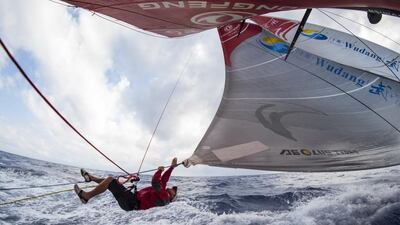Kevin Escoffier shown working on a sail aboard the Dongfeng Race Team boat during Leg 6 of the Volvo Ocean Race. Sam Greenfield / Dongfeng Race Team / Volvo Ocean Race