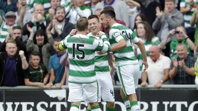 Celtic players celebrate after a goal during their Scottish Premiership victory over Dundee United on Saturday. Graham Stuart / Action Images / Reuters / August 22, 2015