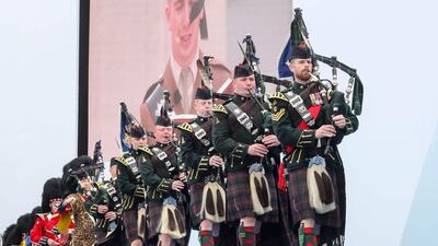 Pipers of the 4th battalion Royal regiment of Scotland play during an event to commemorate the 75th anniversary of the D-Day landings, in Portsmouth, southern England. AFP