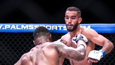 Badreddine Diani, right, and Shido Esperanca fight in their welterweight bout during UAE Warriors Africa.