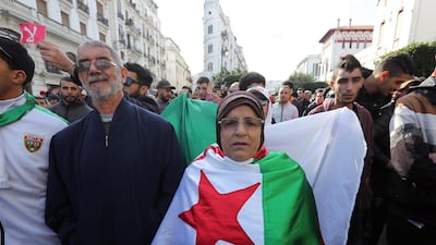 Algerians chant slogans during a protest rally in Algiers, Algeria. Thousands of people have taken to the streets in the capital Algiers calling for a mass boycott of the country's presidential elections, which is taking place on the day, and to voice against the five candidates running to replace ousted president Abdelaziz Bouteflika for being closely linked to the former regime. EPA