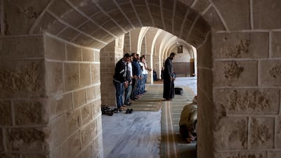 Palestinian Muslim worshipers pray at Al Omari mosque in Gaza City. AP Photo