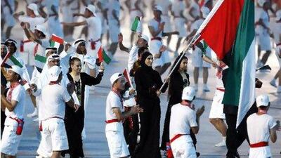 Sheikha Maitha bint Mohammed bin Rashid carries the UAE flag during the opening ceremony at the Beijing Olympics in 2008 and she will compete at the GCC Women's Sports Games.