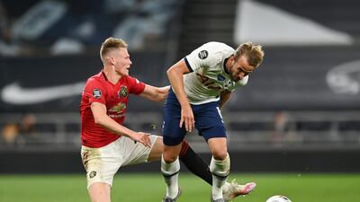 Scott McTominay tackles Harry Kane during the Premier League match between Tottenham Hotspur and Manchester United. Getty Images