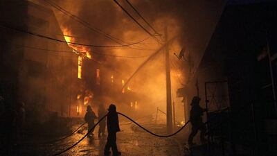 Nearly 12 hours after the blaze began, sirens still howled and ash fell throughout the normally picturesque hills of Valparaiso as firefighters struggled to bring the flames under control. (EPA / April 12, 2014)