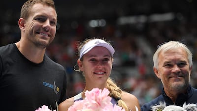 Denmark's Caroline Wozniacki with her husband David Lee and father Piotr at the Australian Open in Melbourne. AFP
