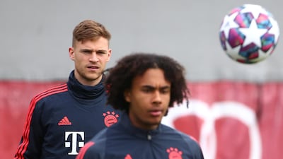 Soccer Football - Champions League - Bayern Munich Training - Saebener Strasse, Munich, Germany - February 24, 2020 Bayern Munich's Joshua Kimmich and Joshua Zirkzee during training REUTERS/Michael Dalder