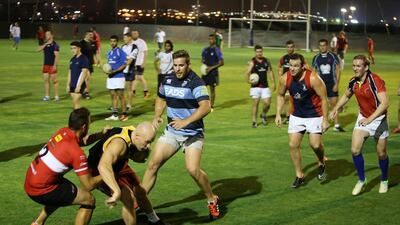 The eligibility of Jaen Botes, centre, to play for the UAE is a big boost to the team and its performance manager Roelof Kotze. Pawan Singh / The National
