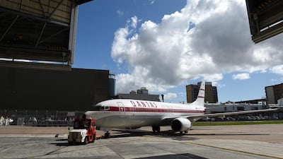 A Qantas aircraft being towed into the hangar at Sydney Airport. The hub operator says a new facility will require state aid. Dan Himbrechts / EPA
