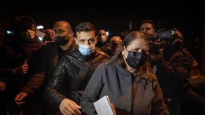 Marwan Barghouti's wife, Fadwa, right, leaves the Palestinian Central Election Commission office after registering her husband's list for the upcoming parliamentary election in May, in the West Bank city of Ramallah, March 31, 2021. AP Photo