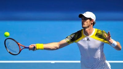 Andy Murray hits a return to Joao Sousa during their Australian Open tie.