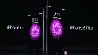 Apple CEO Tim Cook announces the iPhone 6. Justin Sullivan/ Getty Images/ AFP