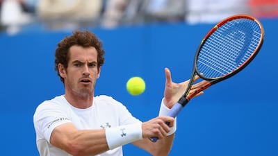 Andy Murray of Great Britain plays a backhand in his men's singles final match against Kevin Anderson of South Africa at the Aegon Championships at Queen's Club on June 21, 2015 in London, England. Getty Images