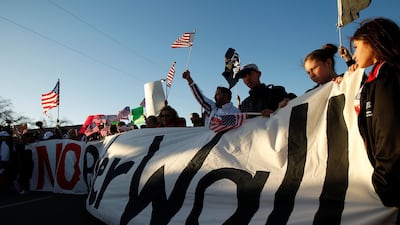 Demonstrators take part in the 'March for Truth: Stop the Wall, Stop the Lies' during the visit of Donald Trump to El Paso. Reuters