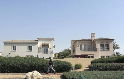 Neighbours in the upscale community said they often leave their doors and garages unlocked. Pawan Singh / The National