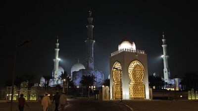 Muslims arrive at Sheikh Zayed Grand Mosque to perform the Eid Ad Adha prayers in Abu Dhabi. This year the holiday will begin on Tuesday, October 15. AP Photo/Kamran Jebreili