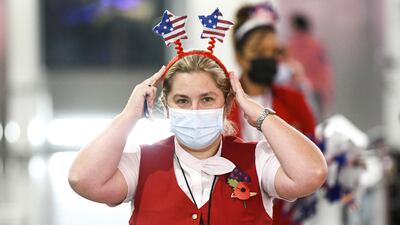 Virgin Atlantic staff at Heathrow prepare for the departures