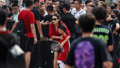 Fans react during the visit of Ronaldo. EPA