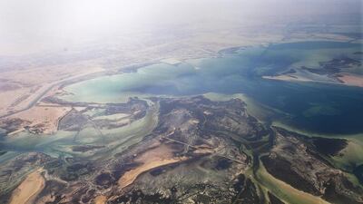 About 2,000 kilometres of Abu Dhabi's mainland and island coastline will be 'revamped' to accommodate economic ventures, while also protecting its environment. Razan Alzayani / The National