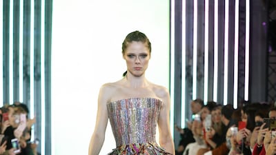 Mini dress with a strapless square deep-split corset embellished with scroll sequins, and a voluminous skirt of matte and glossy sequins sheets