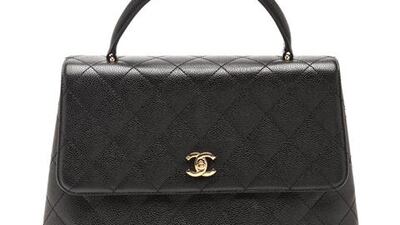 Vintage Chanel black caviar Kelly Bag for sale at Moda Operandi (Courtesy: Moda Operandi)