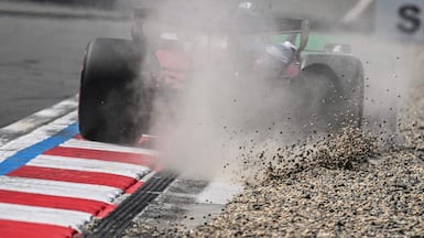 Ferrari's Monegasque driver Charles Leclerc goes off track during a practice session ahead of the Formula One Chinese Grand Prix at the Shanghai International Circuit. AFP