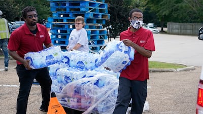 Mississippi state is struggling to get bottled water to residents after running water supplies were disrupted by flooding. AP