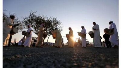 Traditional drummers celebrate the country's anniversary at the Fujairah Fort yesterday. Pawan Singh / The National