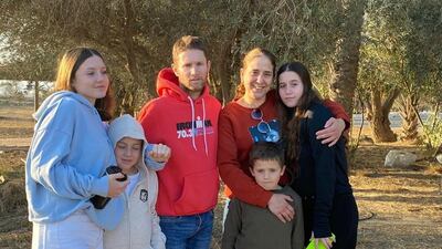Nadav Goldshtein, centre, was killed by Hamas gunmen along with his daughter Yam Goldshtein Almog, far right, at their home in Kibbutz Kfar Aza, while his wife Chen Goldshtein Almog, daughter Agam, and sons Gal and Tal were taken hostage. Photo: Goldshtein-Almog family