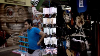 Downside risks to the euro and euro zone economy from the Greece crisis is very limited. Angelos Tzortzinis / AFP