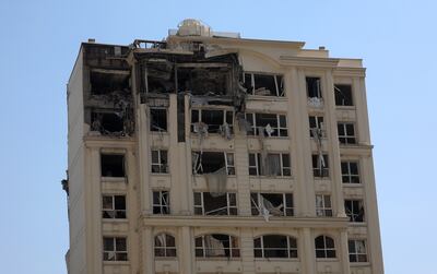 A building hit by Israeli air strikes, north of Tehran. EPA