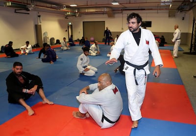 Coach Ramon Lemos of the UAE national Jiu-Jitsu team trains his charges ahead of the 10th Abu Dhabi World Professional Jiu-Jitsu Championship. Chris Whiteoak / The National