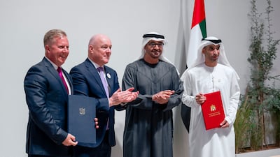 President Sheikh Mohamed and Christopher Luxon, Prime Minister of New Zealand, attend the signing of the Cepa between the two countries in Abu Dhabi, with Dr Thani Al Zeyoudi, Minister of State for Foreign Trade, in attendance. Hamad Al Kaabi / UAE Presidential Court