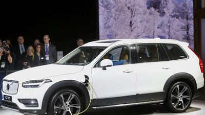 Volvo revealed its new XC-90, which features a unique hybrid system with a gasoline engine and attached electric motor powering the front wheels and an electric motor powering the rear wheels. Mark Blinch / Reuters